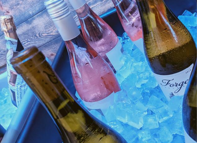 Wine bottles on ice.